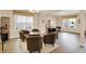 Inviting living room with comfortable seating and a unique barrel-based glass table at 2282 Creekland Dr, Columbus, IN 47201