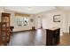 Inviting living area with modern flooring, bright windows, and a stylish serving bar at 2282 Creekland Dr, Columbus, IN 47201