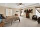 Main bedroom featuring a tray ceiling, carpet, and tasteful decor at 2282 Creekland Dr, Columbus, IN 47201