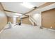 Spacious basement area with open floor plan and neutral color palette at 2463 Kettering Way, Indianapolis, IN 46214