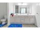 Bathroom featuring a double vanity, ample counter space and adjacent toilet at 2463 Kettering Way, Indianapolis, IN 46214
