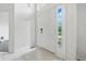 Bright entryway featuring tiled floor, white walls, and a front door with sidelights at 2463 Kettering Way, Indianapolis, IN 46214