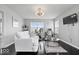 Bright living space with contemporary furnishings, large windows, and a view of the neighborhood at 2499 Blue Ridge Dr, Greenwood, IN 46143