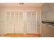 A storage closet provides ample storage space with a large set of bi-fold doors at 2613 W Queensbury Rd, Muncie, IN 47304
