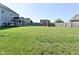 Large backyard with a screened porch and plenty of space for recreational activities at 2734 Chalbury Dr, Plainfield, IN 46168