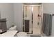 The bathroom includes a stand up shower with glass door, a toilet and neutral walls at 2734 Chalbury Dr, Plainfield, IN 46168