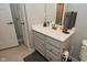 Bathroom features a neutral colored vanity with mirror, toilet and neutral paint at 2734 Chalbury Dr, Plainfield, IN 46168