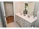 Bathroom featuring a double vanity, stylish fixtures, and an open doorway to the hallway at 2734 Chalbury Dr, Plainfield, IN 46168