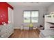 A bedroom featuring a dresser and window overlooking the neighborhood at 2734 Chalbury Dr, Plainfield, IN 46168