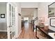 Bright entryway with hardwood floors and views into the open living space at 2734 Chalbury Dr, Plainfield, IN 46168