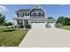 Charming two-story home with a three-car garage and well-maintained landscaping at 2734 Chalbury Dr, Plainfield, IN 46168