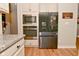 Sleek kitchen featuring stainless steel appliances, granite countertops, and modern built-in microwave and oven at 2734 Chalbury Dr, Plainfield, IN 46168