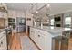 Contemporary kitchen with a large island, granite countertops, stainless appliances, and open layout at 2734 Chalbury Dr, Plainfield, IN 46168