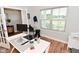 Well-lit office with modern desk, shelving, and ample workspace at 2734 Chalbury Dr, Plainfield, IN 46168