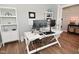 Bright office featuring modern desk, dual monitors, and stylish decor at 2734 Chalbury Dr, Plainfield, IN 46168