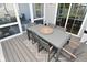 Relaxing screened porch with outdoor dining table on the rear of the home at 2734 Chalbury Dr, Plainfield, IN 46168