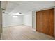 Spacious basement area featuring clean painted walls and a large storage closet at 2811 Beech Dr, Columbus, IN 47203