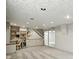 Spacious basement featuring carpeting, recessed lighting, and built-in shelving and desk area at 2811 Beech Dr, Columbus, IN 47203