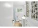 Clean bathroom with updated cabinets, hardware and a shower-tub combo at 2811 Beech Dr, Columbus, IN 47203