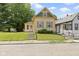 Charming home with well-kept lawn and inviting entrance, perfect for a starter Gathering at 29 E Caven St, Indianapolis, IN 46225