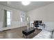 Cozy living room with ample natural light, hardwood floors, and neutral wall color at 29 E Caven St, Indianapolis, IN 46225