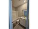 Clean bathroom with white vanity, toilet, and shower-tub combo at 3068 Gibbert Ln, Westfield, IN 46074