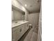 Bathroom featuring double vanity, large mirror, and shower tub combo at 3068 Gibbert Ln, Westfield, IN 46074