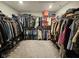 Massive walk-in closet providing ample storage space for clothing and shoes at 3068 Gibbert Ln, Westfield, IN 46074