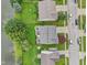 Birds-eye view of neighborhood with pond access and street parking at 3341 Carica Dr, Indianapolis, IN 46203