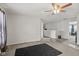 This bedroom features an open area, ceiling fan, and a black rug at 3341 Carica Dr, Indianapolis, IN 46203