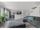 Open-concept living room featuring modern design, plush furniture, and lots of natural light at 3341 Carica Dr, Indianapolis, IN 46203