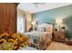 Cozy bedroom with a comfortable queen bed and decorative bedside lamps at 3399 Nottinghill Blvd, Plainfield, IN 46168