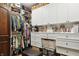 Walk-in closet with custom built-in shelving, drawers, and ample space for organization at 3399 Nottinghill Blvd, Plainfield, IN 46168