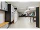 Spacious three car garage with organized storage and workbench areas at 3399 Nottinghill Blvd, Plainfield, IN 46168