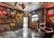 Unique garage design features neon signage, rustic decor and a leather recliner at 3399 Nottinghill Blvd, Plainfield, IN 46168