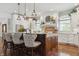 A spacious kitchen featuring a large island, stainless steel appliances, and ample cabinet space at 3399 Nottinghill Blvd, Plainfield, IN 46168