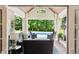 Inviting outdoor living space featuring comfortable seating, a fireplace, and views of the swimming pool at 3399 Nottinghill Blvd, Plainfield, IN 46168