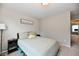 Bedroom featuring a bed with plush pillows, natural light, and a side table at 3443 Thomas Jefferson St, Westfield, IN 46074