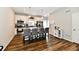 Modern kitchen with granite countertops, stainless steel appliances, and an island with bar seating at 3443 Thomas Jefferson St, Westfield, IN 46074