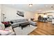 Spacious living room with a large sectional sofa, area rug, and open layout to the kitchen at 3443 Thomas Jefferson St, Westfield, IN 46074