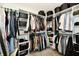 Spacious walk-in closet with custom shelving, hanging rods, and ample storage baskets at 3443 Thomas Jefferson St, Westfield, IN 46074