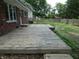 Spacious wood deck off the back of the home with a wooden fence at 3518 Woodale Rd, Indianapolis, IN 46234