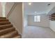 Spacious basement featuring new carpet and ample natural light from the large window at 3518 Woodale Rd, Indianapolis, IN 46234
