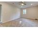 Bedroom with neutral paint, carpet and view of trees outside the window at 3518 Woodale Rd, Indianapolis, IN 46234