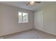 This bedroom features carpet and a window at 3518 Woodale Rd, Indianapolis, IN 46234