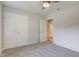 This bedroom features carpet and a double door closet at 3518 Woodale Rd, Indianapolis, IN 46234