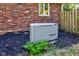 Exterior view of a home backup generator for peace of mind during power outages at 3518 Woodale Rd, Indianapolis, IN 46234