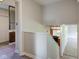 Upstairs hallway with multiple open doors with a view of the Kitchen at 3518 Woodale Rd, Indianapolis, IN 46234