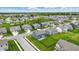 Aerial view of a residential area featuring well-kept lawns, tree-lined streets, and inviting single-Gathering homes at 3650 Merchmont Rd, Bargersville, IN 46106