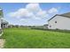 Expansive fenced backyard with a lush green lawn, offering plenty of space for recreation at 3650 Merchmont Rd, Bargersville, IN 46106